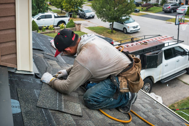 Professional Roofing technician working in Grandview, IN